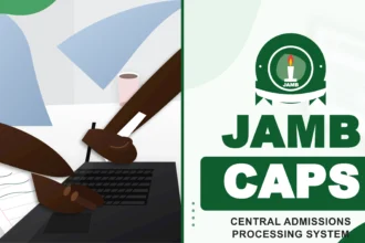 A student reviewing admission status details on a laptop screen using the JAMB CAPS portal dashboard.